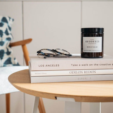 Geodesis nature candle in brown glass with books